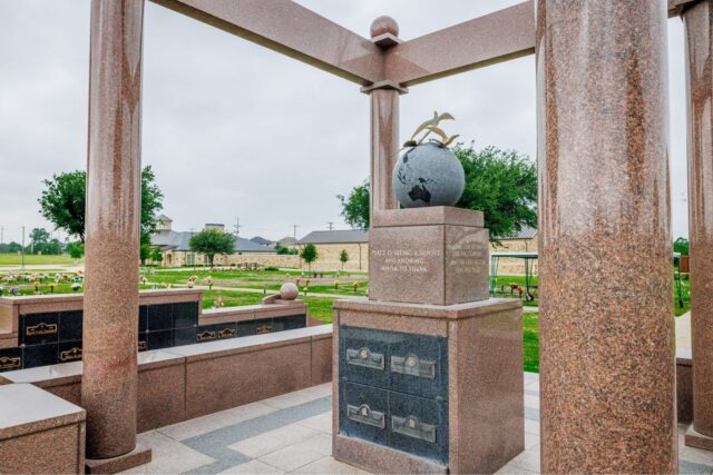 Globe and bronze bird sculpture in the Peace Garden at Ridgeview West Memorial Park